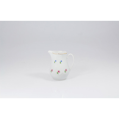 Biały porcelanowy dzbanek do mleczka 200 ml JASTRA marki Lubiana. Naczynie o pękatym kształcie zdobią delikatne motywy drobnych niebieskich i różowych kwiatów.
