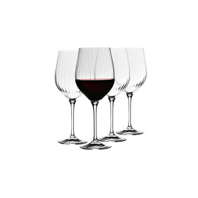 Zestaw czterech kieliszków do wina Harmony Lumi od Krosno Glass o pojemności 530 ml. Przezroczyste szkło z pionowym żłobieniem, jeden kieliszek wypełniony