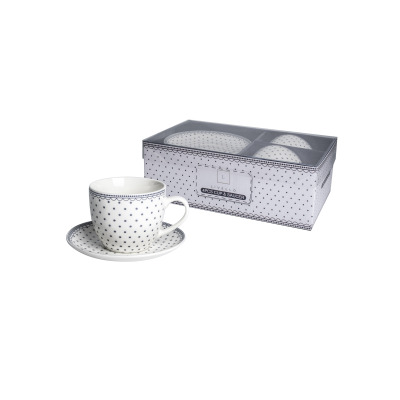 Zestaw dwóch filiżanek 250 ml ze spodkami marki Kaczyński Sp.J. w kropki. Jedna filiżanka stoi na spodku, pozostałe w opakowaniu z napisem Livello 4pcs Cup &