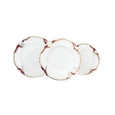 Zestaw talerzy Ćmielów 0040 ROCOCO w liczbie trzech sztuk o różnej wielkości. Biała porcelana z eleganckim bordowym zdobieniem i złotym ornamentem na brzegach.