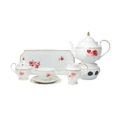 Zestaw do herbaty Ćmielów G529 Astra Akwarela dla 6 osób. Biała porcelana zdobiona motywem kwiatowym, złotymi liniami i ażurowym wzorem. Komplet z dzbankiem na